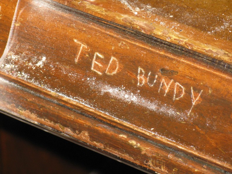 Ted Bundy carved his name into the defendants table during trial