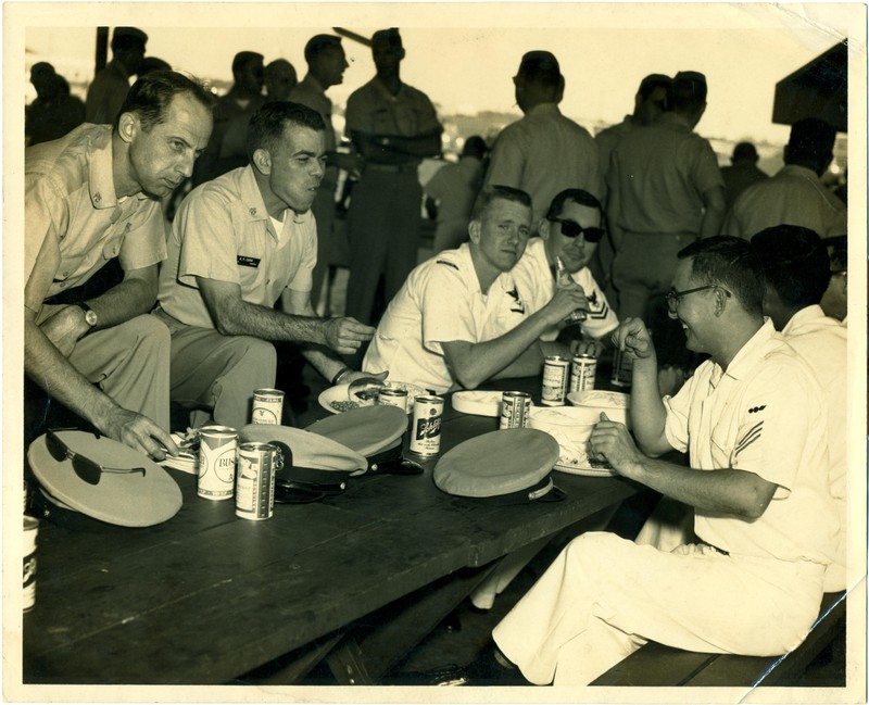 Inspection committee members enjoying a lunch on the base.