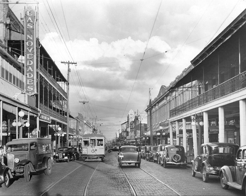 7the Ave. Noveades on left with new sign. 1937