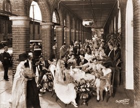 A wedding party held in El Pasaje's arcade. Circa late 1800s, early 1900s. 