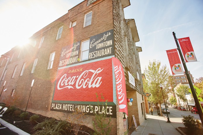 Newly restored Coca-Cola mural on what is now High Street Pasta Co.
