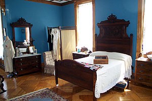 One of the upstairs bedrooms within the home.