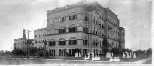 Sisters of the Daughters of Charity sit outside the hospital, circa 1920s. 