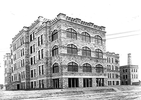 Hospital in 1915 with working being done inside