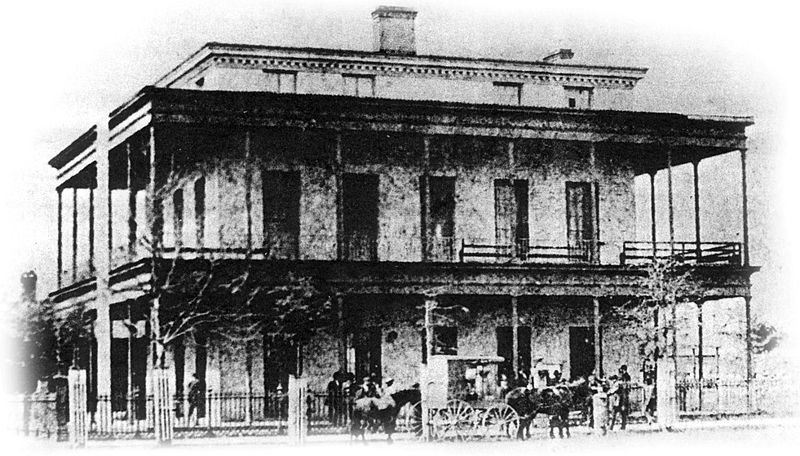 The original Customs House and Post Office building before the third floor balcony was added. Photo believed taken between 1850s-1860s. No one mourned the building's loss in the 1880 fire. 