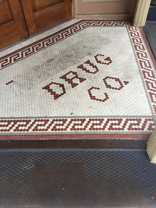 Original mosaic floor when entering Harry's Seafood
