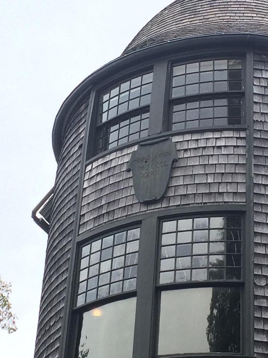 Close-up of a tower on the exterior of the Bell House