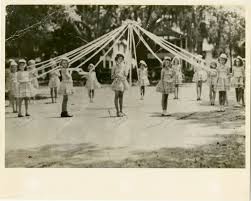 Children playing outside the school in 1945.