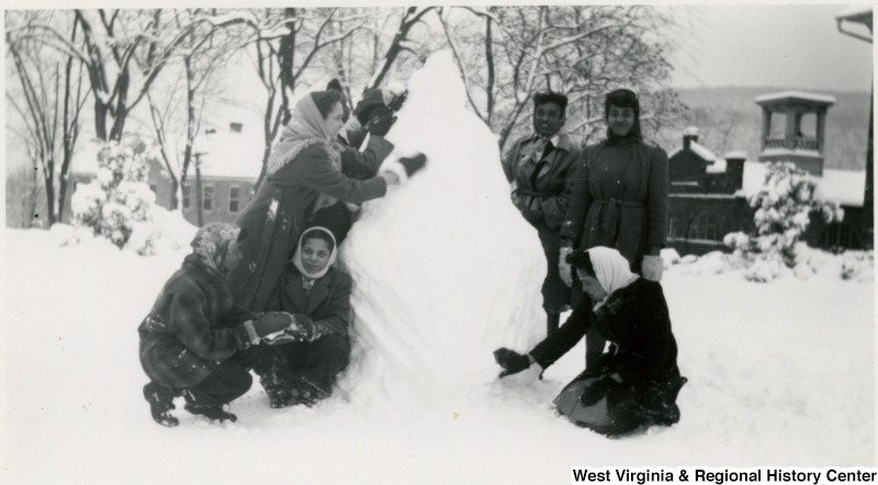 Storer students build a snowman on campus, likely during the "Great Snow" of 1941. Photo courtesy of West Virginia and Regional History Center, WVU Libraries.