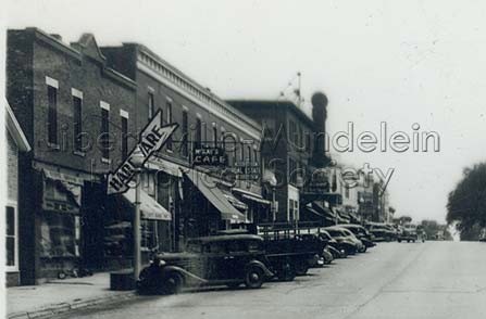 Milwaukee Avenue, looking south from Lake Street, Butler Building on the left, circa 1940