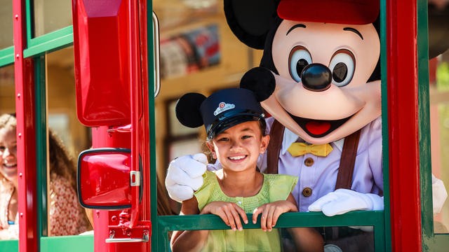 This photo shows one of America's most iconic characters, Mickey Mouse exploring Disney's California Adventure Park, image from https://disneyland.disney.go.com/destinations/disney-california-adventure/.