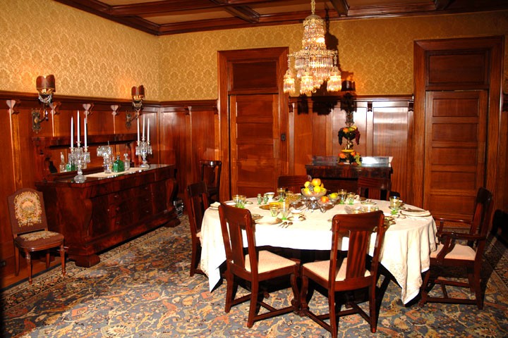 A dining room inside an old home.