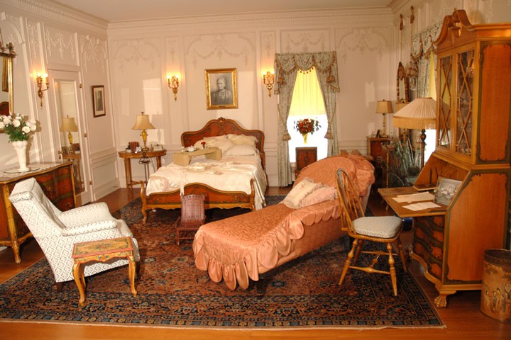 A bedroom inside an old home.