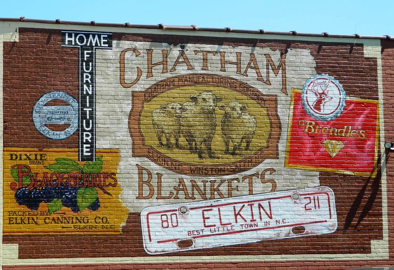 One of the many murals in downtown Elkin. This showcases businesses that were famous in Elkin from decades past.