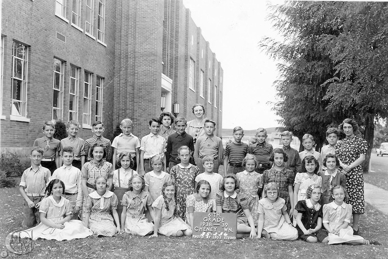  The 6th grade class of 1938-39 standing by the east side of the hall.