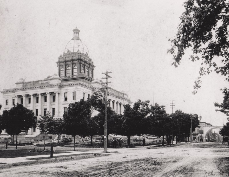 Manitowoc Co.Courthouse under construction at corner of South 8 St. and Hancock Street, in Manitowoc, looking north. Almost completed. Date:1906 - 1907.