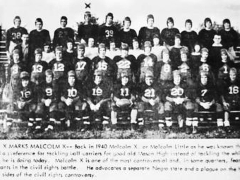 Malcolm, indicated by an X, on the Mason High School football team in 1940