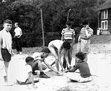 Although the picture focuses on the boys, you can see what the citadels looked like that boys slept in.