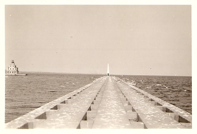 South side pier with northside lighthouse on the left. (1930s)