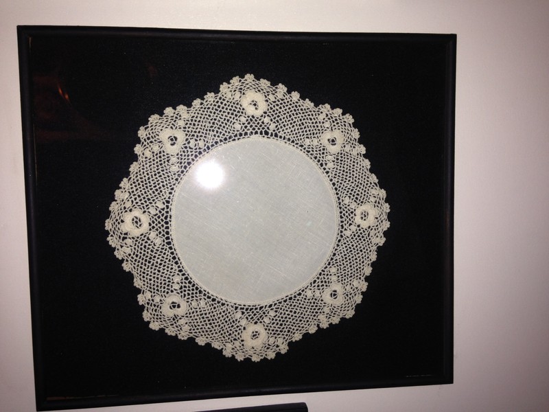 An embroidered decoration for a table made by Mary Zalud.