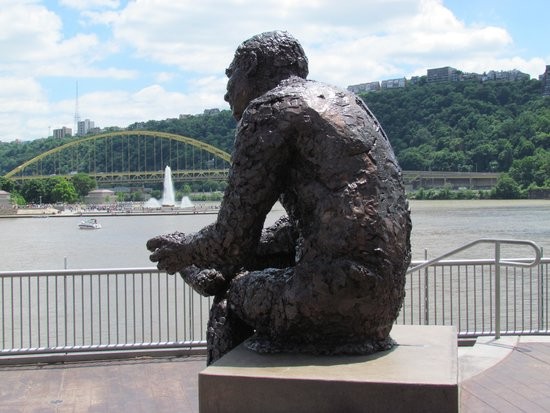 Mr. Rogers Memorial with the fountain at the Point and Ft. Pitt Bridge in the background.