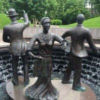 A memorial statue in front of the Ford Presidential Museum, dedicated to those who fought for better working conditions in the 1911 furniture factory strike