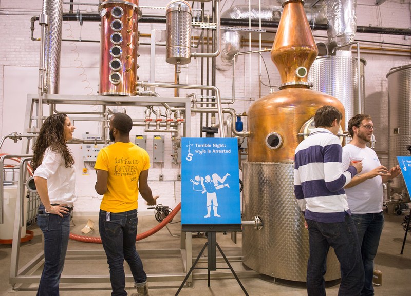 Patrons tour the Wigle Distillery.