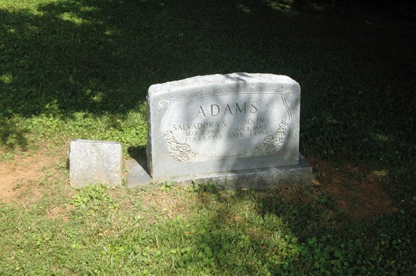 One of the two remaining headstones in the Black section of the cemetery.