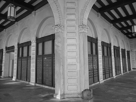 The building's original design allowed box owners to access their mail at any time. Today, the postal boxes are enclosed.