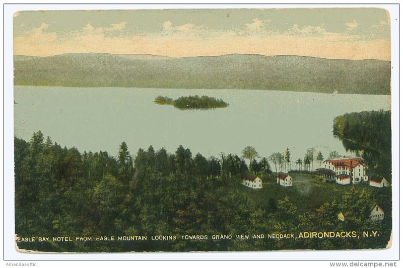 The town of Eagle Bay in 1914, with the previous hotel still standing.