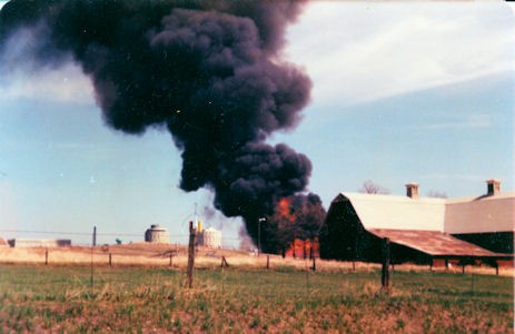 The back of the barn is visible in this photo of the April 25, 1977 fire that destroyed the Memorial Fieldhouse along Washington Street on the Eastern Washingtion University campus.