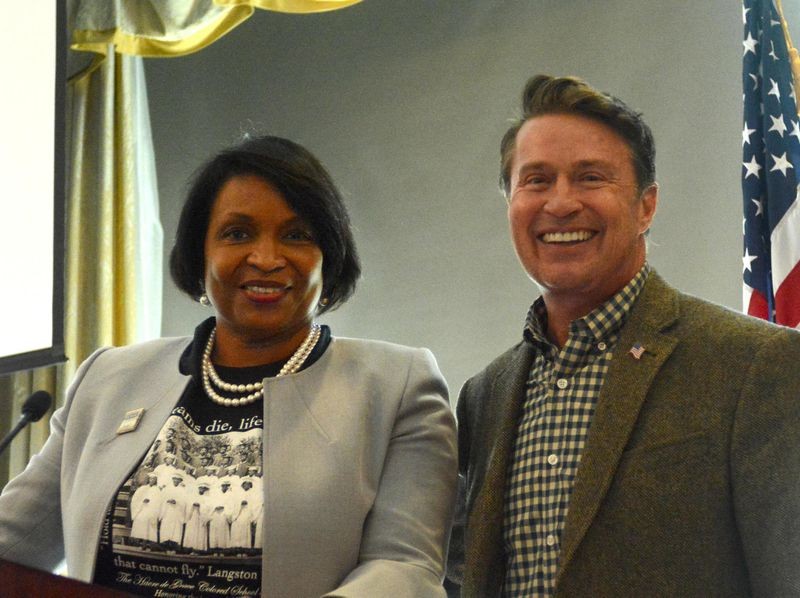 Chairman of the Havre de Grace Colored School Foundation Patricia Cole, left, stands with Harford County Executive Barry Glassman