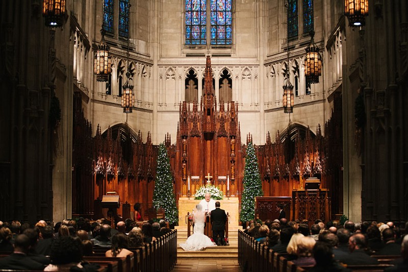 A wedding ceremony taking place within the chapel.