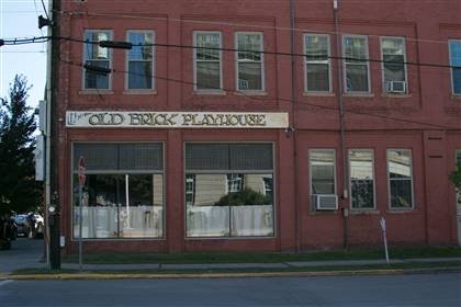 Built for the Randolph Garage Company, this historic building is now home to the Old Brick Playhouse. 