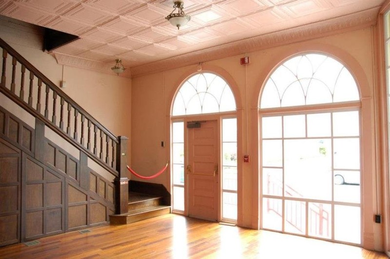 Photo of the entry with the pressed metal ceilings visible

Taken from WV Historic Theaters