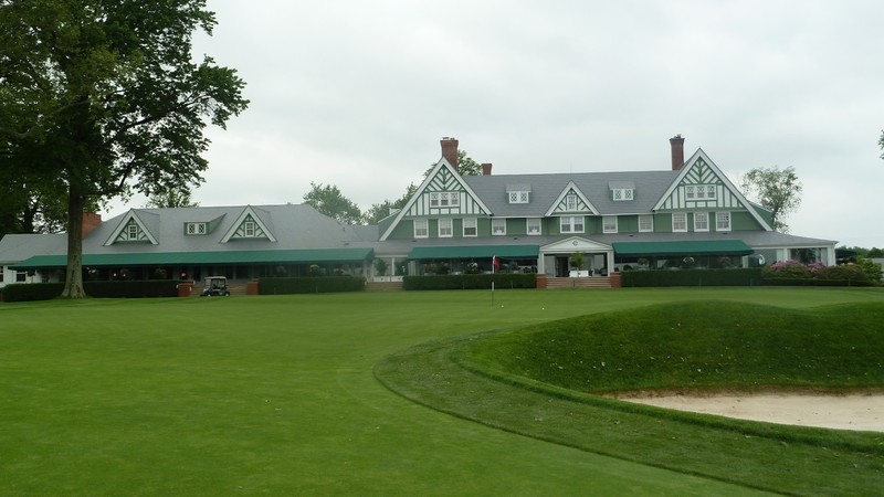 The renovated club house with 18th green in the foreground.