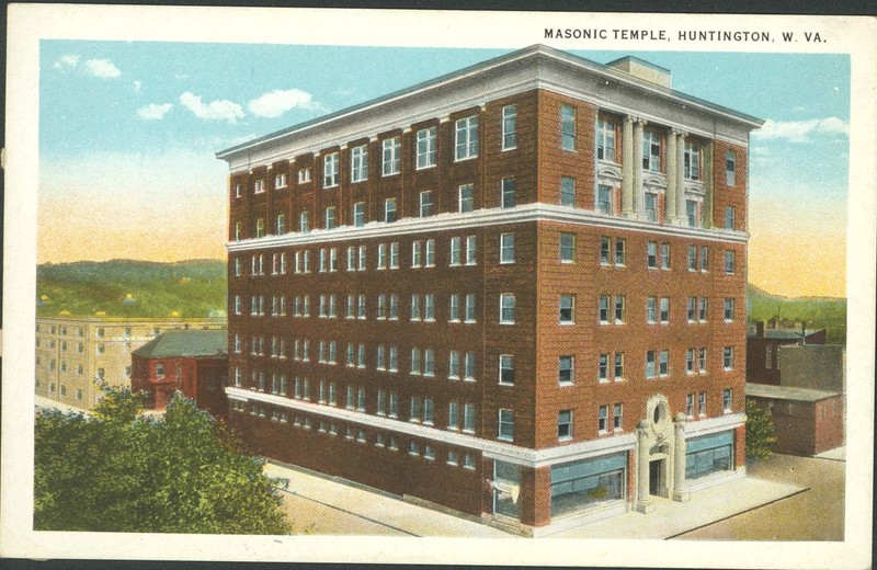 This early postcard of the Masonic Temple shows the building before the construction of the eastern half in 1922. Image courtesy of Marshall University Special Collections .