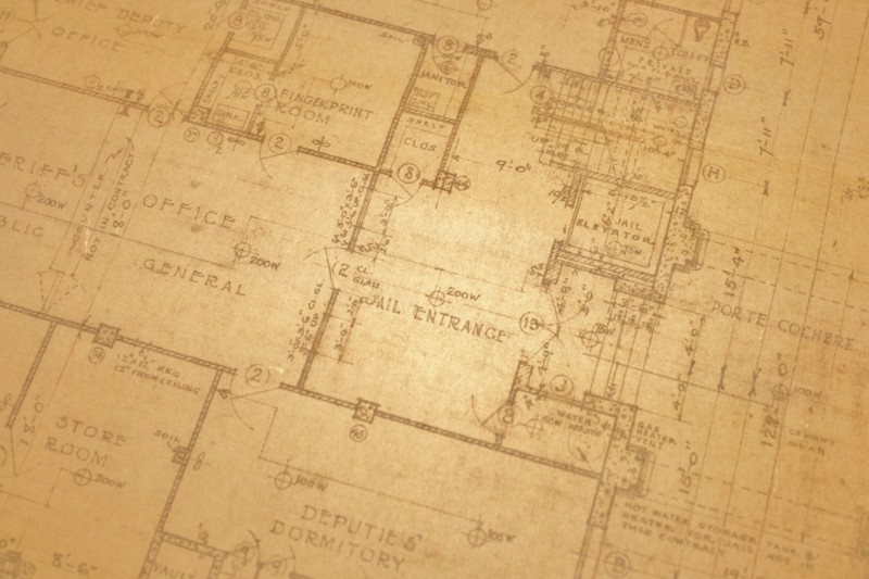 Hand-drawn plans for the 1929 courthouse include a deputies’ dormitory and a fingerprint room, which was fairly new technology in criminal investigations.
