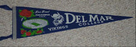 A photograph of a vintage pennant for Del Mar University from the 1950’s. It is a special edition from the Rose Bowl.