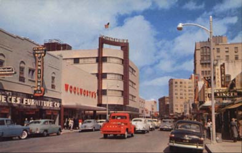 This postcard shows Chaparral Street looking north, at the time one of the main and busiest streets in the city and the location of the original YWCA branch of Corpus Christi,