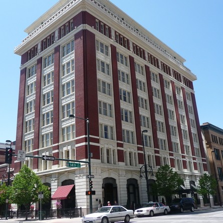 This historic building was designed in the Renaissance Revival style of architecture and features terra cotta and coffered plastered ceilings.