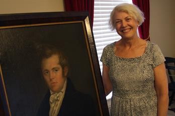 Carolyn Lansden Whittle with the portrait that she had donated with her great-great-great grandfather, David A. Smith.

Illinois College History