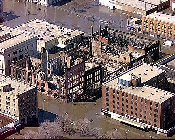 The Security, New Hampshire Apts. (center of remains), and Dinnie Buildings destroyed by ire during the Red River flood of 1997