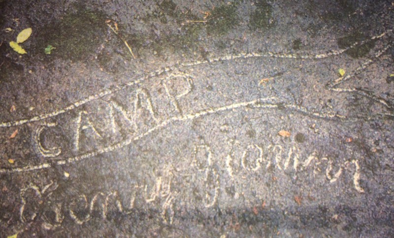 The cursive signature of the artist who drew the shield. (via Rick Steelhammer from the Gazette Mail June 3, 2007)