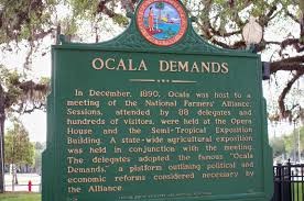 This placard, describing the meeting held in which the "Ocala Demands" were made, is situated outside of the Marion Block House as a historical marker.