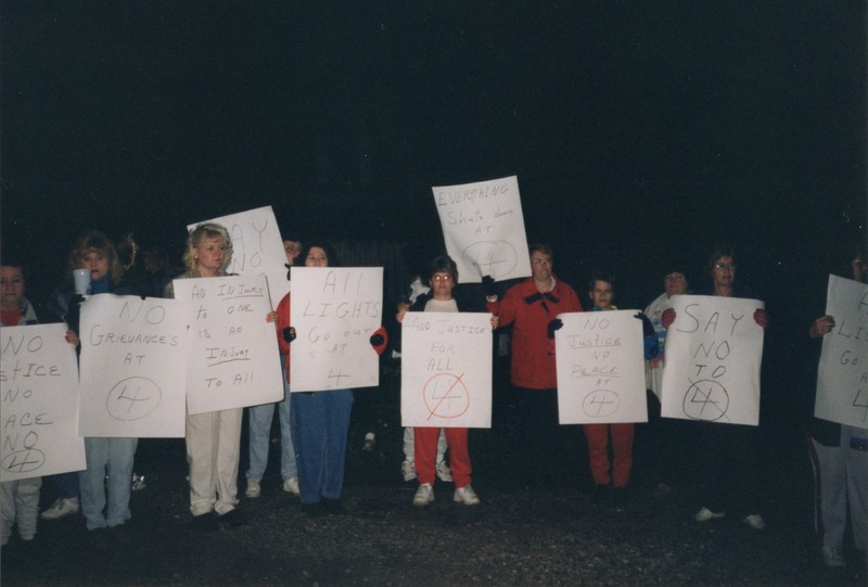 Corbin Ltd. Employees on strike in park across from Vernon St. Factory, Huntington, WV, 1991