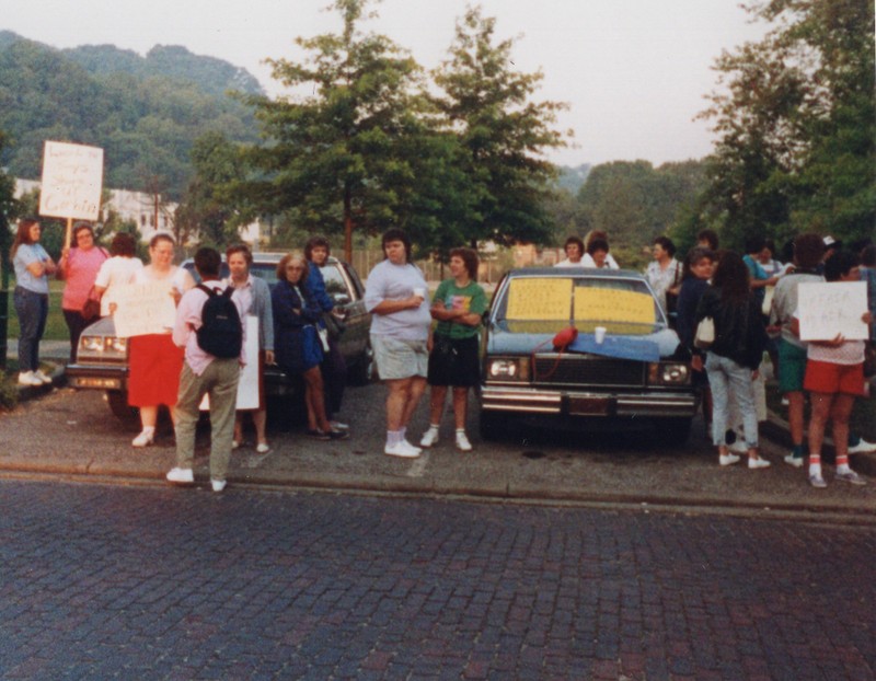 Corbin Ltd. Employees on strike in park across from Vernon St. Factory. Employees could only protest in morning, during breaks, or on lunch. Huntington, WV, 1991