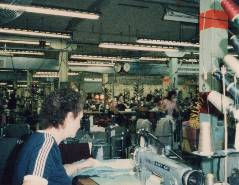 Corbin Ltd. Machine Operator Jeanette Mays sewing back pockets on trousers, Huntington, WV, 1985