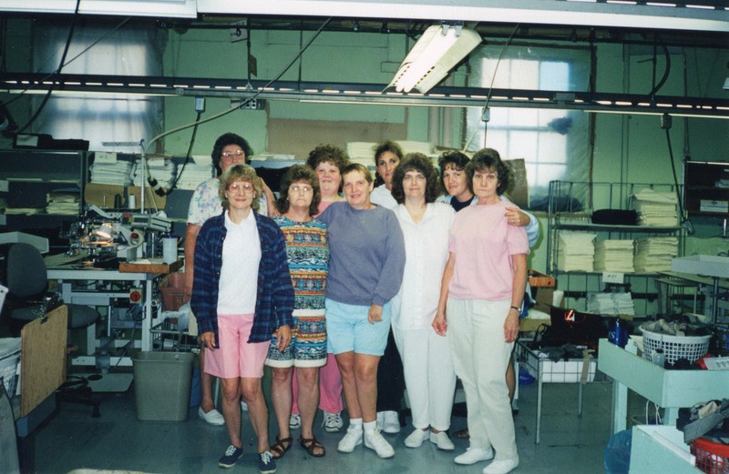 Corbin Ltd. Machine Operators Kay Fisher, Myrtle Watson, Betty Simpkins, Unidentified, Unidentified, Becky Perry, Unidentified, Unidentified, and Lorella Cooper, Huntington, WV