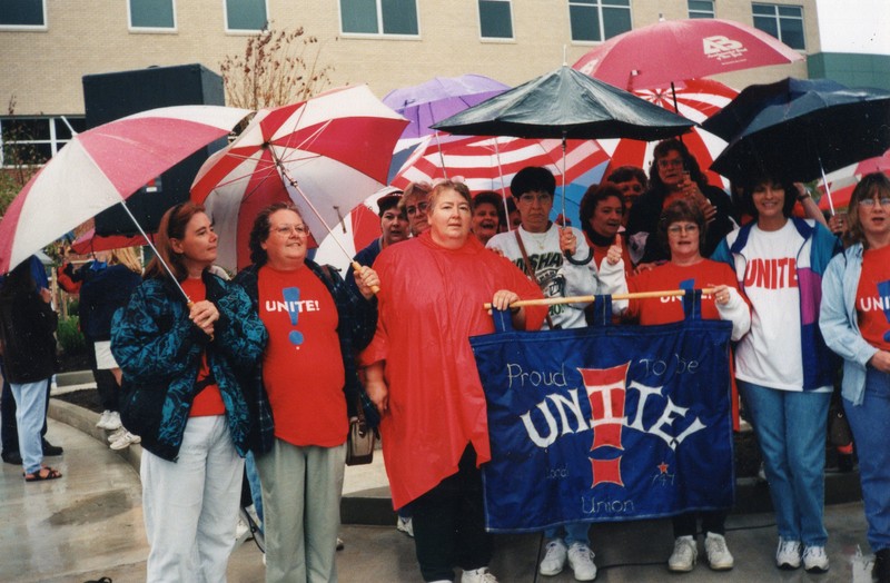 Donna Holland and Betty Simpkins holding sign, Cabell Huntington Hospital Protest to support CHH Nurses Union, Huntington, WV